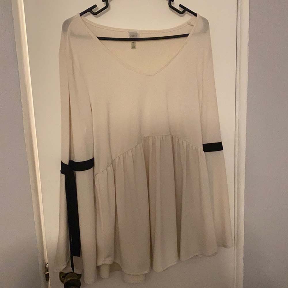 Cupio Cream Blouse with Black Ties on sleeves